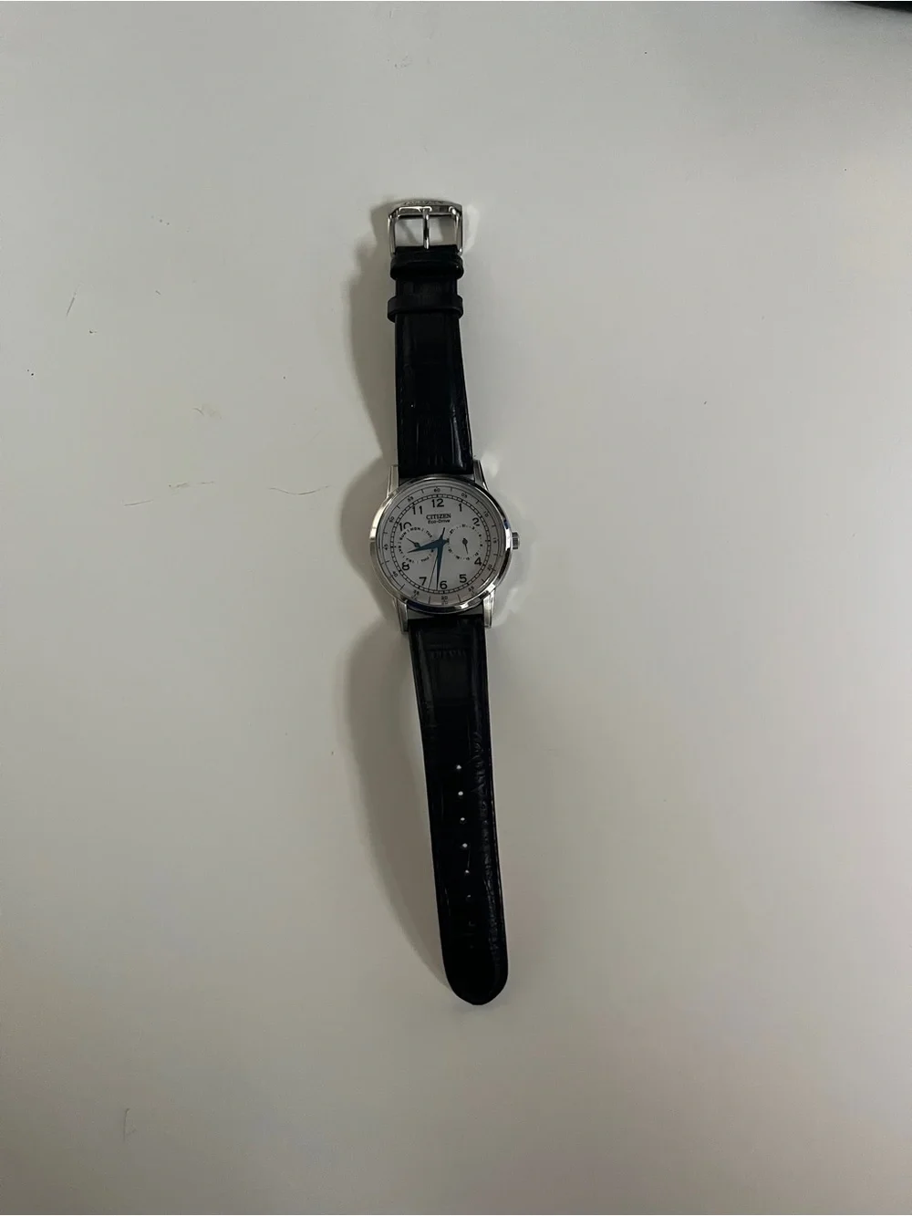 Citizen Silver Dial Watch with Blue Hands and Black Strap